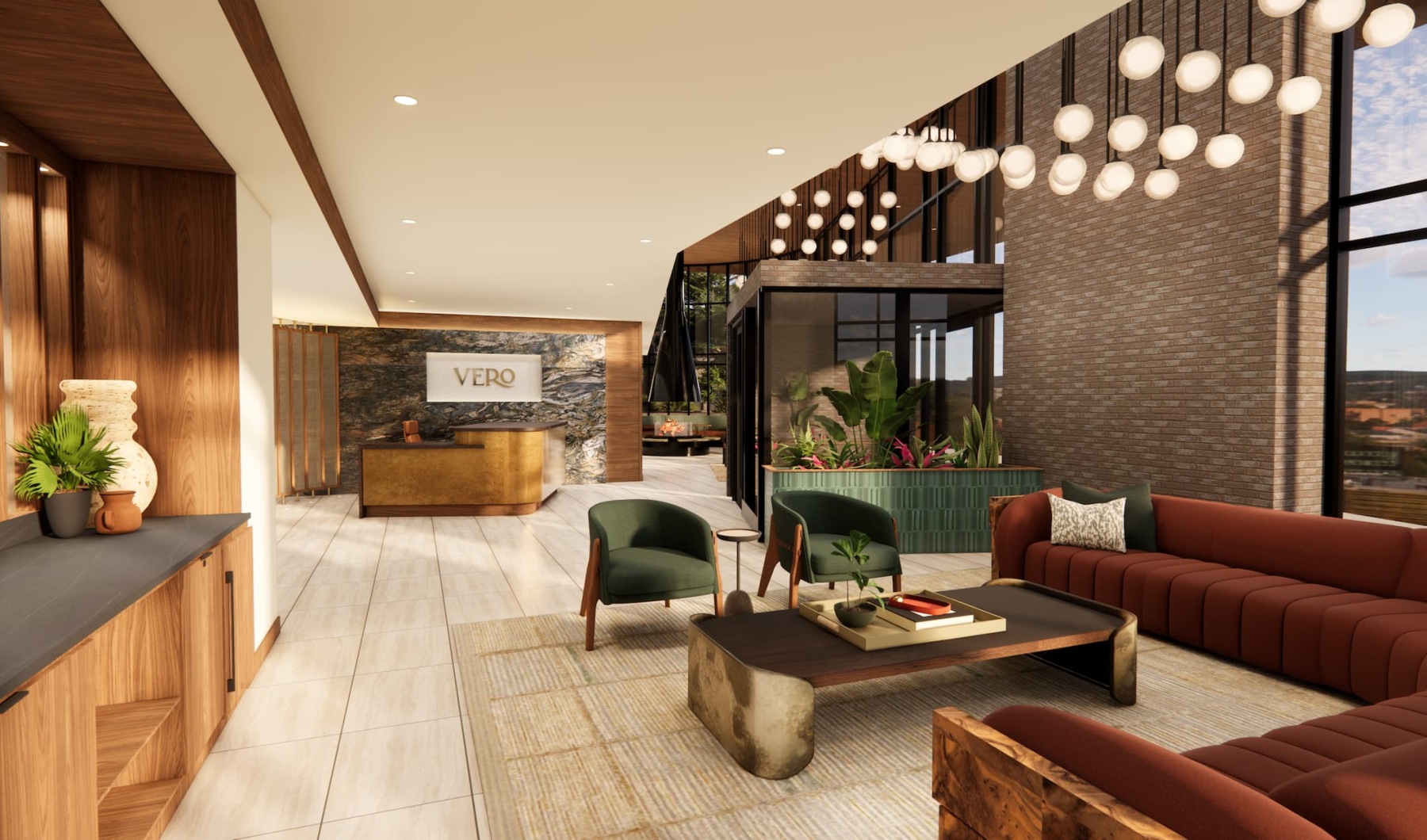 lounge with warm lit areas, seating and high ceilings